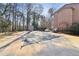 Community pool with surrounding deck area and lounging chairs, and a storage shed at 1525 Terrell Mill Se Pl # A, Marietta, GA 30067