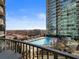 Balcony with stunning pool and city views at 943 Peachtree Ne St # 902, Atlanta, GA 30309