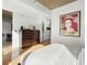 Bright bedroom with large window, dresser, and modern decor at 943 Peachtree Ne St # 902, Atlanta, GA 30309