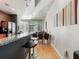 Open concept dining area with hardwood floors and modern lighting at 943 Peachtree Ne St # 902, Atlanta, GA 30309