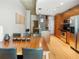 Modern kitchen with wood cabinets, granite counters, and stainless steel appliances at 943 Peachtree Ne St # 902, Atlanta, GA 30309