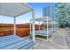 Relaxing poolside area with modern lounge chairs and shade structures at 943 Peachtree Ne St # 902, Atlanta, GA 30309