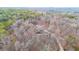 Home surrounded by trees, showcasing private setting at 9545 Grande Dr, Winston, GA 30187