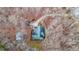 Home nestled in the woods with a long driveway at 9545 Grande Dr, Winston, GA 30187