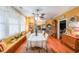Charming dining area with built-in window seat and hardwood floors at 9545 Grande Dr, Winston, GA 30187