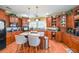 Spacious kitchen with island, hardwood floors, and stainless steel appliances at 9545 Grande Dr, Winston, GA 30187