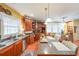 Kitchen with island, granite counters, and built-in seating at 9545 Grande Dr, Winston, GA 30187