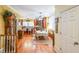 Kitchen features hardwood floors, an island, and a dining area at 9545 Grande Dr, Winston, GA 30187