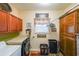 Bright laundry room with washer, dryer, and ample storage at 9545 Grande Dr, Winston, GA 30187
