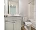 Clean and well-lit bathroom featuring a vanity with white cabinets and a shower-tub combination at 4722 Blake Loop, Atlanta, GA 30349