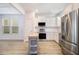 Bright kitchen with stainless steel appliances, island and wood-look floors at 4722 Blake Loop, Atlanta, GA 30349
