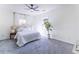 Bright bedroom featuring neutral decor, ceiling fan, carpeted floor and natural light at 109 Shirley Se Ln, Acworth, GA 30101