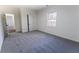 Neutral bedroom with a window bringing in natural light and gray carpeted floors at 109 Shirley Se Ln, Acworth, GA 30101