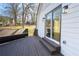 Outdoor deck features built-in bench seating and glass sliding doors, perfect for relaxing or entertaining at 109 Shirley Se Ln, Acworth, GA 30101