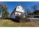 Inviting two-story home featuring a charming entryway, updated landscape, and unique architectural details at 109 Shirley Se Ln, Acworth, GA 30101