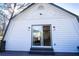 Exterior shot of a house with modern lighting on an outdoor deck and unique architectural details at 109 Shirley Se Ln, Acworth, GA 30101