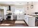 Bright kitchen featuring modern appliances, white cabinetry, and an island with seating at 109 Shirley Se Ln, Acworth, GA 30101
