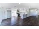 Open-concept kitchen featuring white cabinets, a center island, and stainless steel appliances at 109 Shirley Se Ln, Acworth, GA 30101
