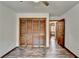 Spacious bedroom with wood floors and access to another room at 3898 Buckland Dr, Lilburn, GA 30047