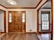 Bright entryway with hardwood floors and wood door at 3898 Buckland Dr, Lilburn, GA 30047