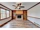 Gathering room with brick fireplace and built-in shelves at 3898 Buckland Dr, Lilburn, GA 30047