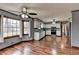 Open concept kitchen with stainless steel appliances and hardwood floors at 3898 Buckland Dr, Lilburn, GA 30047