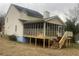 House with screened porch and deck overlooking yard at 1759 Bertram Sw Ln, Marietta, GA 30008