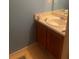 Small bathroom with sink and wooden vanity at 1759 Bertram Sw Ln, Marietta, GA 30008