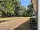 A view of the property's expansive and partially shaded backyard at 3453 Eisenhower E Cir, Atlanta, GA 30354