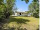Large backyard, mostly grass, with some trees at 3453 Eisenhower E Cir, Atlanta, GA 30354