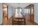 Bright dining room featuring hardwood floors and built-in hutch at 650 Old Orchard Sw Dr, Marietta, GA 30064