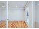 Hardwood floor bedroom with window and glass doors at 23111 Plantation Ne Dr, Atlanta, GA 30324