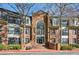 Brick building with large arched windows and a welcoming entrance at 23111 Plantation Ne Dr, Atlanta, GA 30324