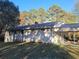 Ranch house exterior with carport and large backyard at 74 Sandy Path, Rockmart, GA 30153