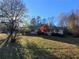 Ranch house with carport and a large yard at 74 Sandy Path, Rockmart, GA 30153