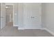 Bedroom with double doors and access to hallway at 485 Paces Dr, Lithia Springs, GA 30122