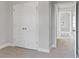 Bedroom with double doors to closet and access to hallway at 485 Paces Dr, Lithia Springs, GA 30122