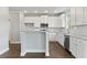 Modern kitchen with white cabinets and granite countertops at 485 Paces Dr, Lithia Springs, GA 30122