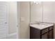 Small bathroom with granite countertop and dark brown vanity at 495 Paces Dr, Lithia Springs, GA 30122