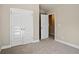 Bedroom with double doors and neutral decor at 495 Paces Dr, Lithia Springs, GA 30122