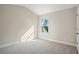 Bright bedroom with carpeted floor and window at 495 Paces Dr, Lithia Springs, GA 30122
