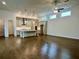 Spacious living room with hardwood floors, ceiling fan and large windows at 515 Cottage Creek Dr, Cumming, GA 30040