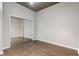 Bedroom with mirrored closet and hardwood floors at 855 Peachtree Ne St # 2914, Atlanta, GA 30308