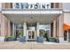 Building entrance with modern design and landscaping at 855 Peachtree Ne St # 2914, Atlanta, GA 30308