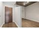Bright entryway with hardwood floors and mirrored closet at 855 Peachtree Ne St # 2914, Atlanta, GA 30308
