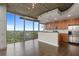 Open concept kitchen with island and stainless steel appliances at 855 Peachtree Ne St # 2914, Atlanta, GA 30308