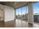 Bright living room with hardwood floors and stunning city views at 855 Peachtree Ne St # 2914, Atlanta, GA 30308
