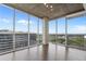Spacious living room with hardwood floors and floor to ceiling windows at 855 Peachtree Ne St # 2914, Atlanta, GA 30308