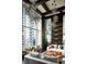 Sophisticated lounge with stunning city views and unique lighting at 855 Peachtree Ne St # 2914, Atlanta, GA 30308