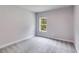 Bedroom with a neutral carpet and light gray walls providing a soothing space at 8981 Callaway Dr, Winston, GA 30187